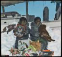 Image of Eskimo [Inuit] Children Alongside Bowdoin with Books